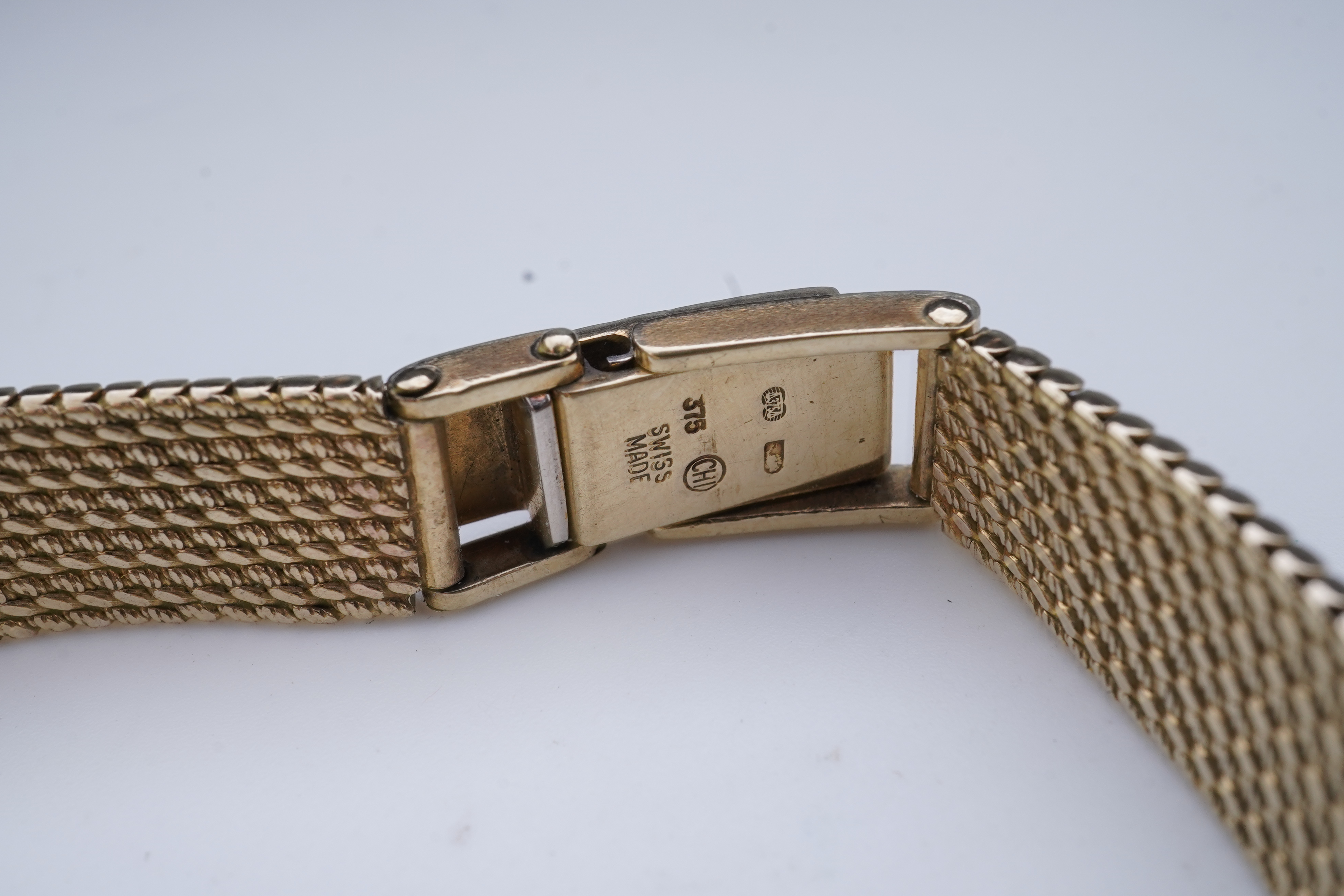 Longines, a gold watch